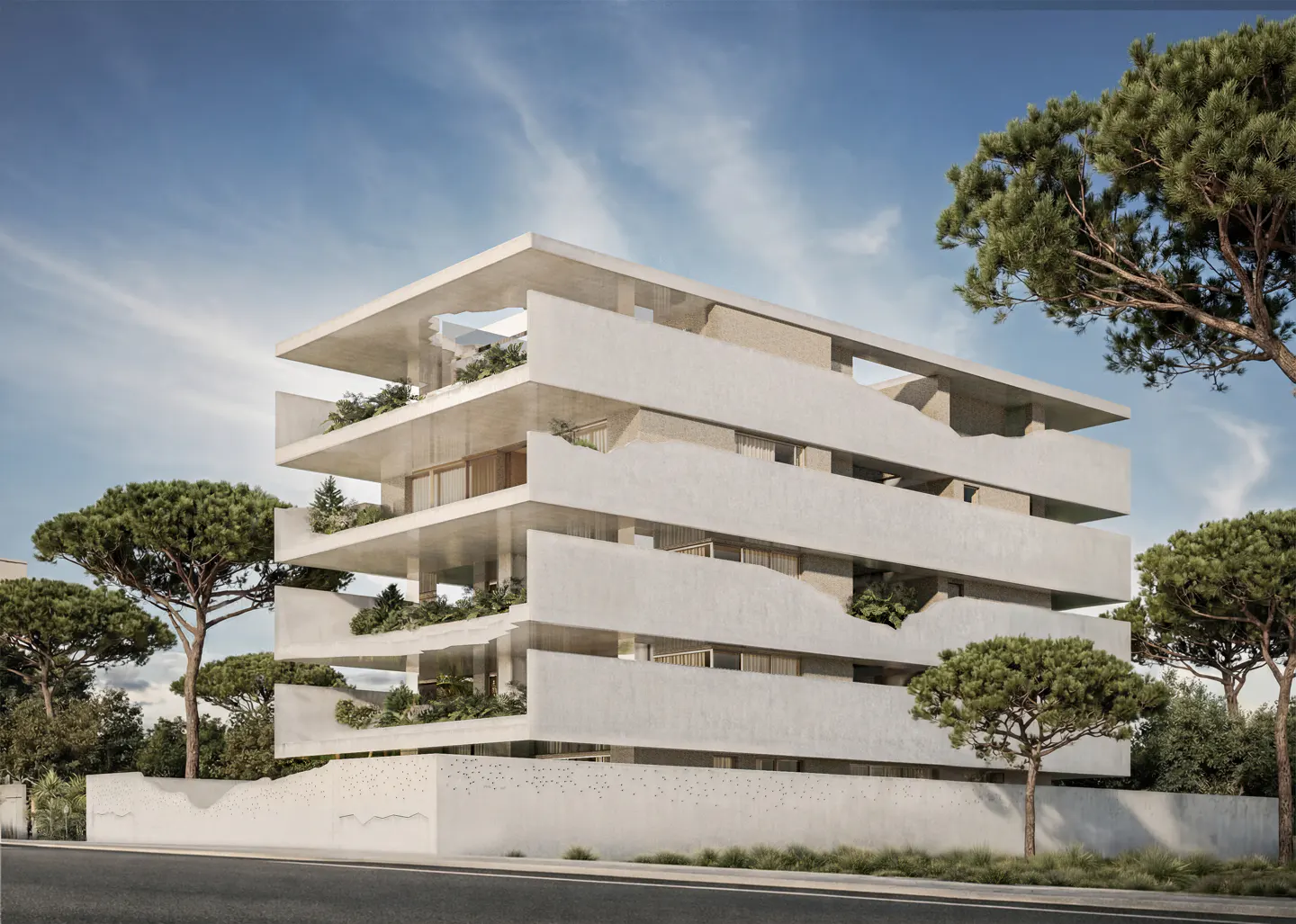 Modern white apartment building with layered balconies and greenery, set against a blue sky and trees.
