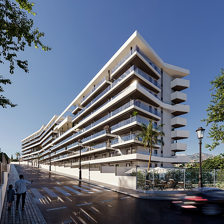 Modern white apartment building with long, tiered balconies and glass railings under a clear blue sky on a sunny day.