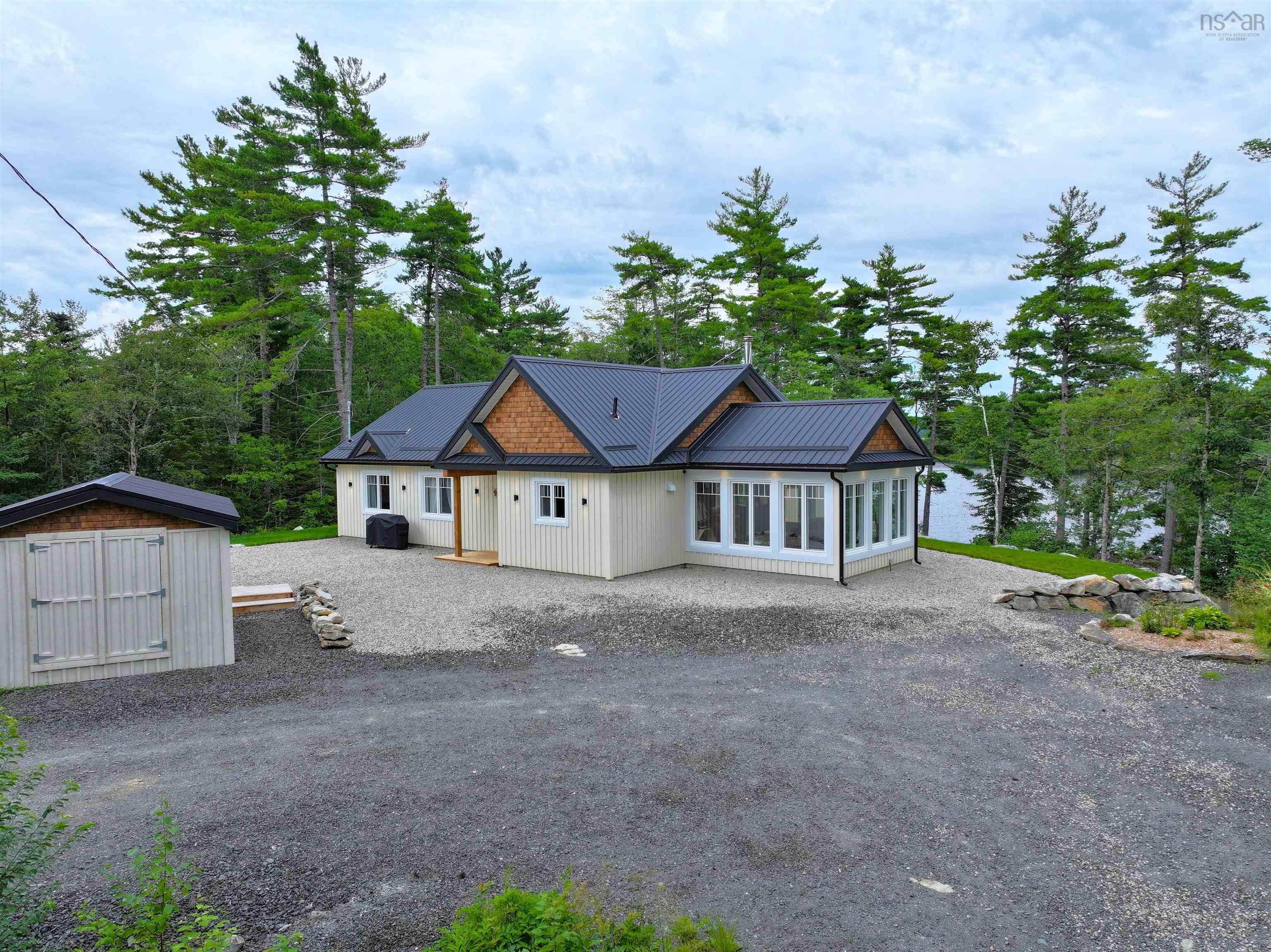 Modern Luxury with Effortless Lakefront Living