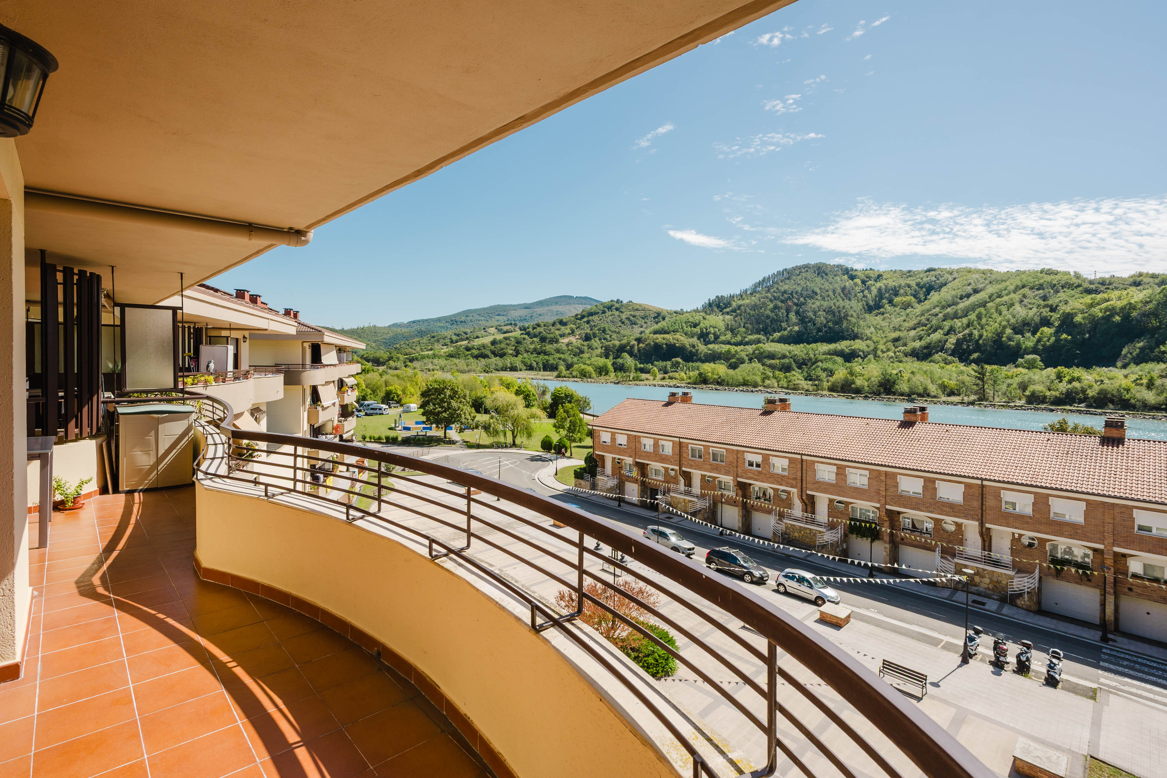 Recently renovated home with spacious south-facing terrace and river views.