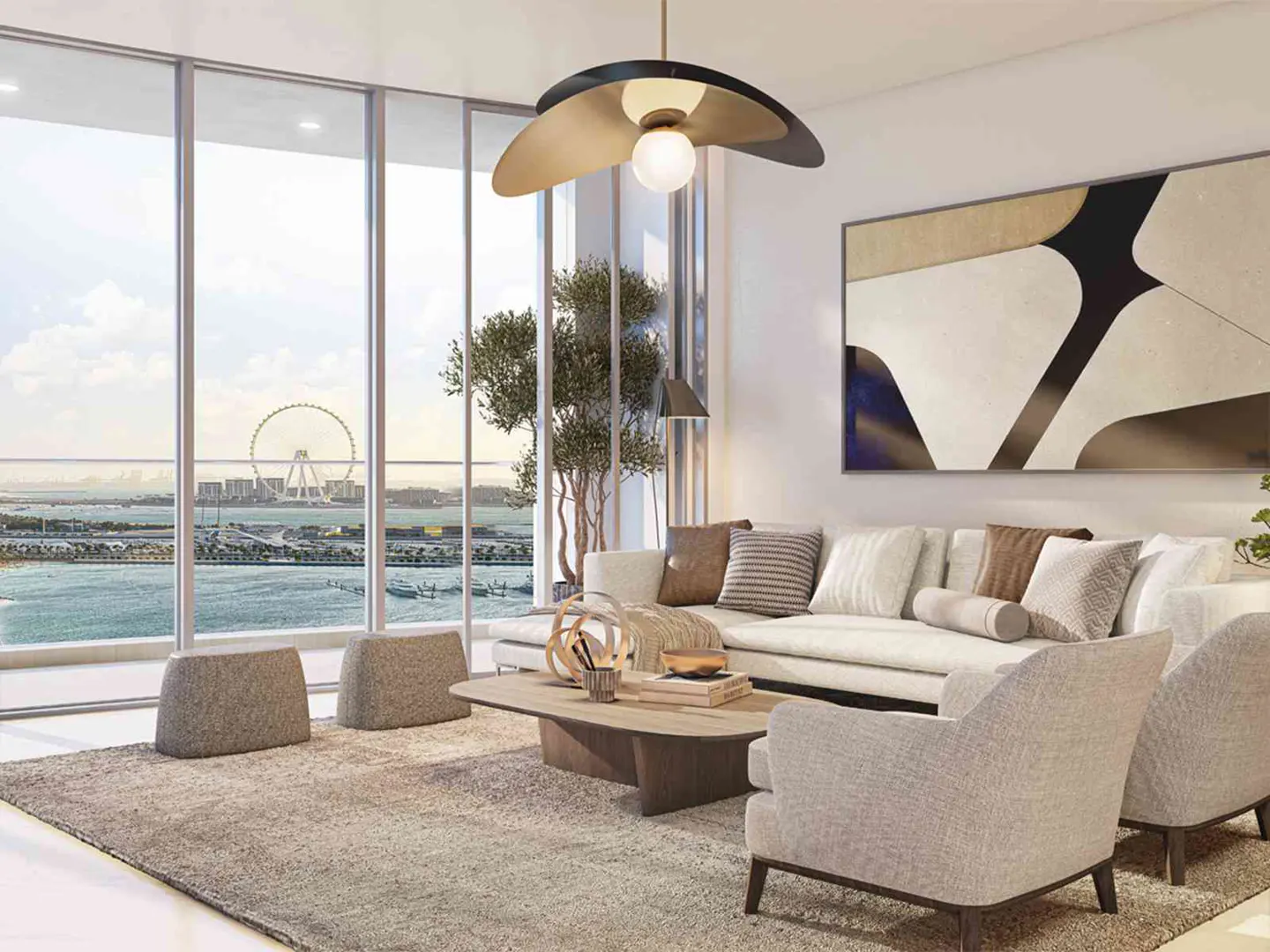 Bright living room with a beige sofa, armchairs, and a coffee table on a gray rug. Large windows offer a view of the sea and a Ferris wheel.