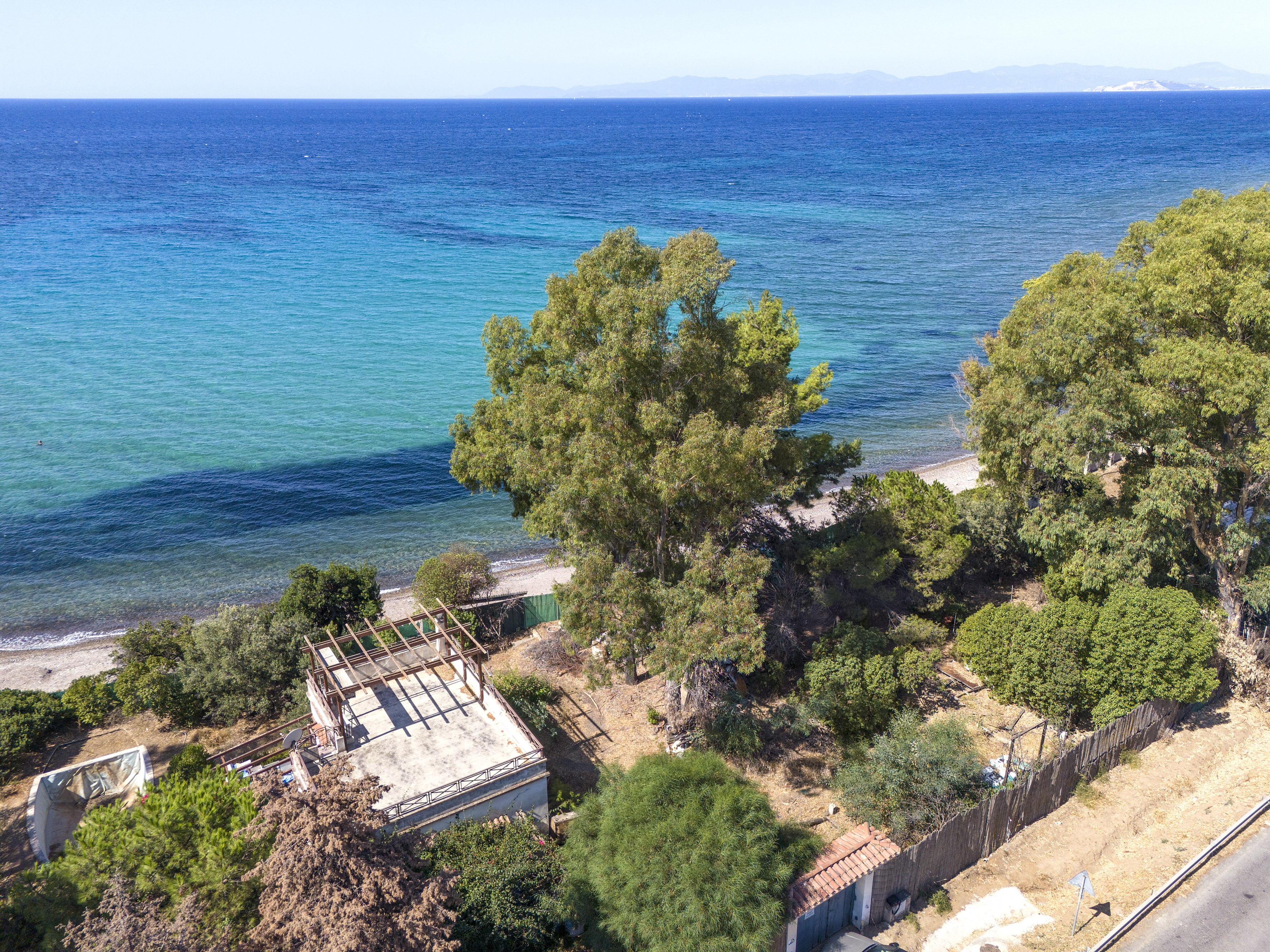 Seafront Renovation Opportunity with Pool and Sunset Views