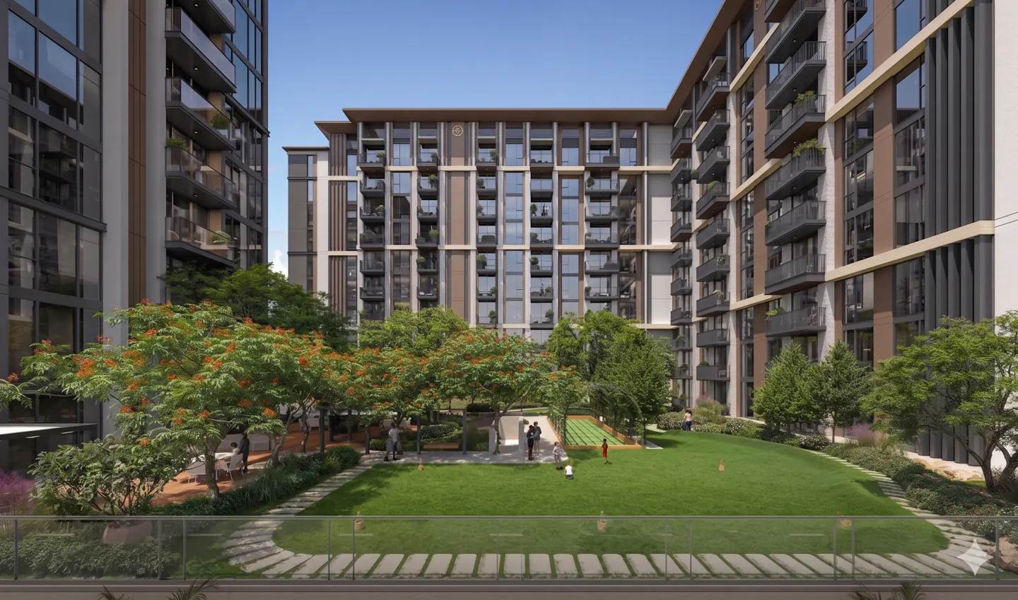 Modern apartment buildings surround a lush green courtyard with trees, a lawn, and people walking on a stone path.