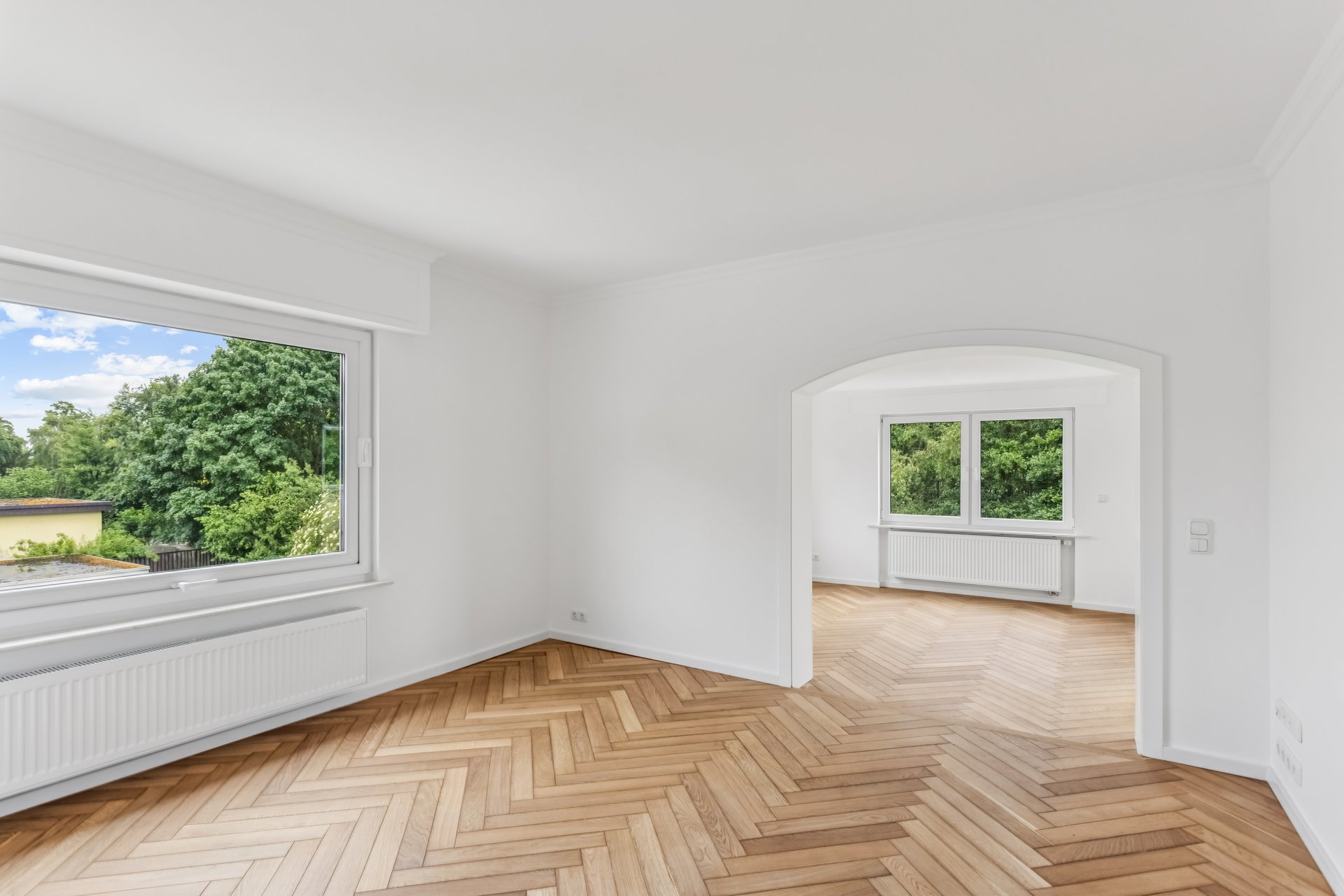 Exklusive 3,5-Zimmer-Wohnung mit Wintergarten, Designerbad und idyllischem Gartenparadies