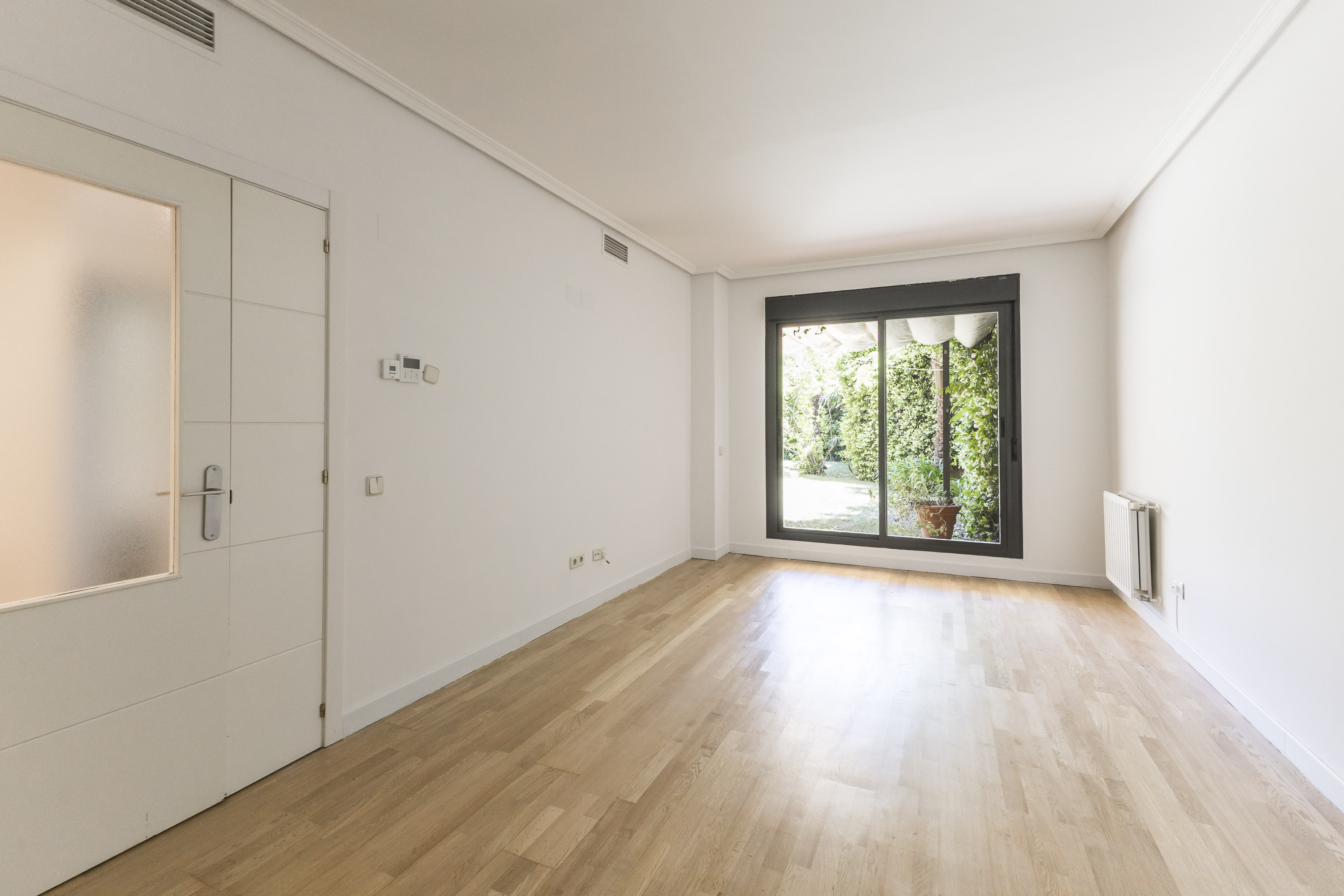Engel & Völkers presents this home with private garden in Sanchinarro