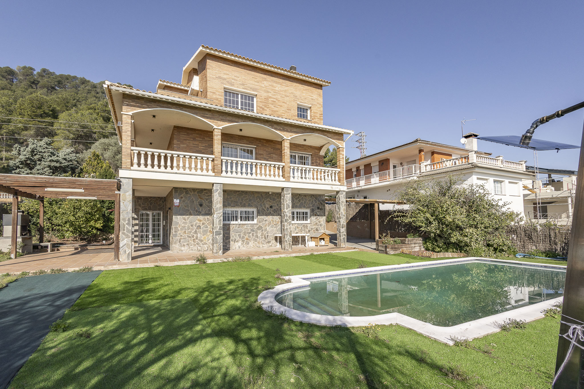 Discover Elevated Living in Vallirana, Barcelona—452 m² Villa with Mountain Views, Terrace, Garden, Pool, Attic, Basement & Underground Garage
