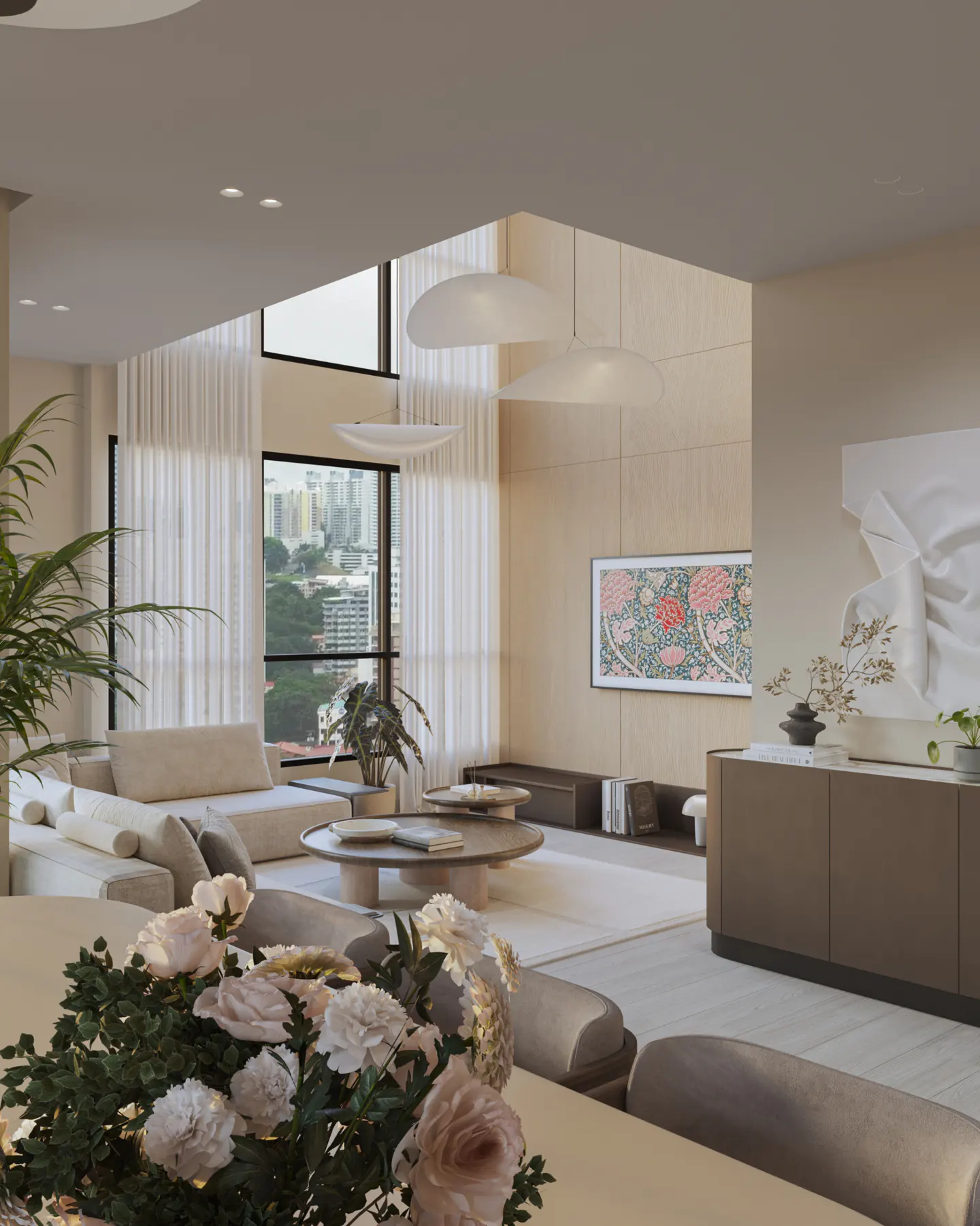 Bright, modern living room with beige sofa, round tables, and city view through large windows. Floral art on TV and white sculpture add elegance.