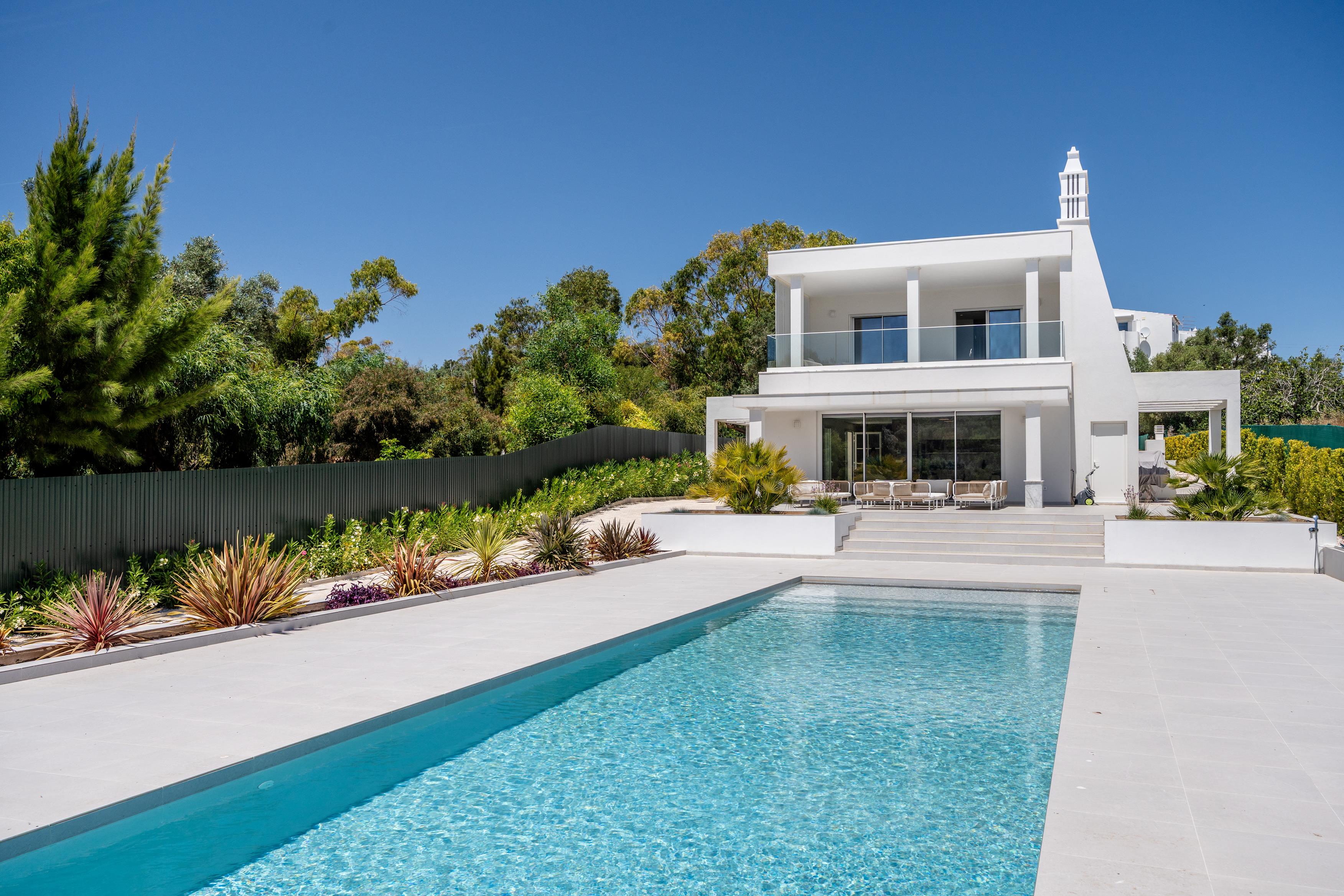 Luxury property in Alvor | 4-bed villa + 2-bed guest house | Heated pool | Walk to town center & beaches