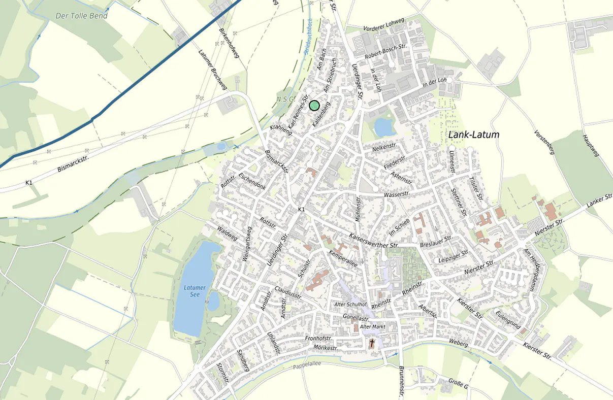 A map of the Lank-Latum area in Germany, featuring a green location pin marking a specific property site.