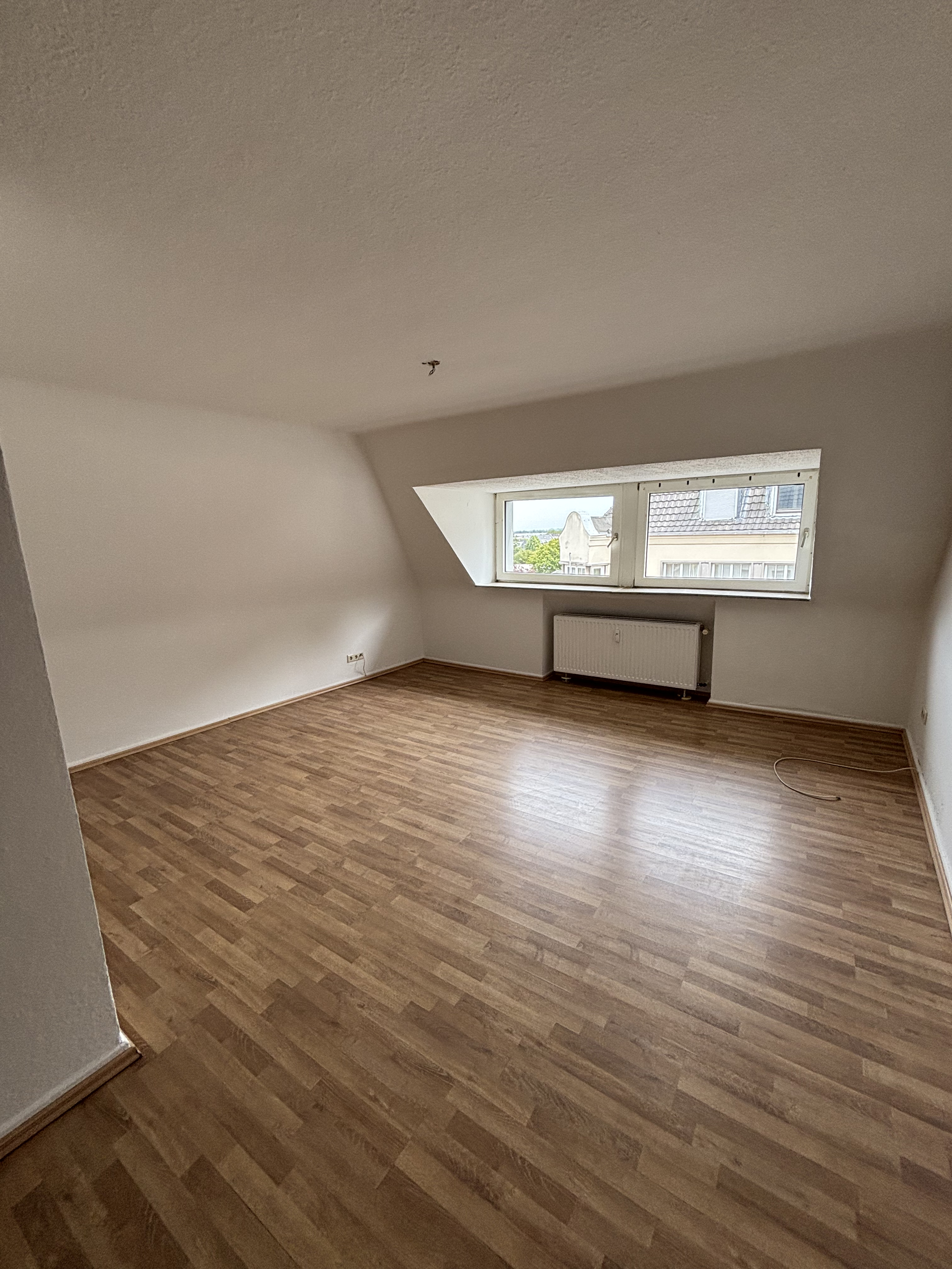 Dachgeschosswohnung in Innenstadtlage mit Garagenstellplatz