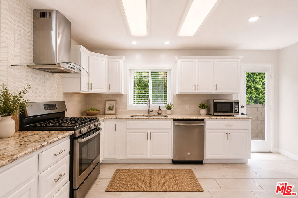 The Ultimate Multi-Generational Woodland Hills Compound