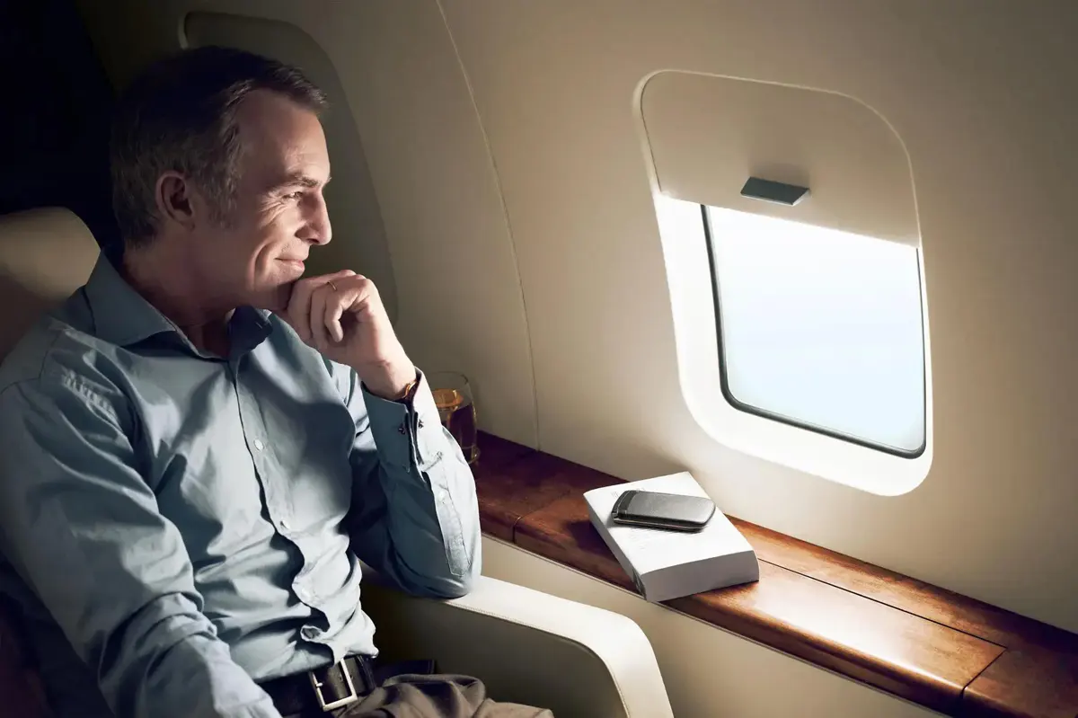 Person looking out of an airplane window