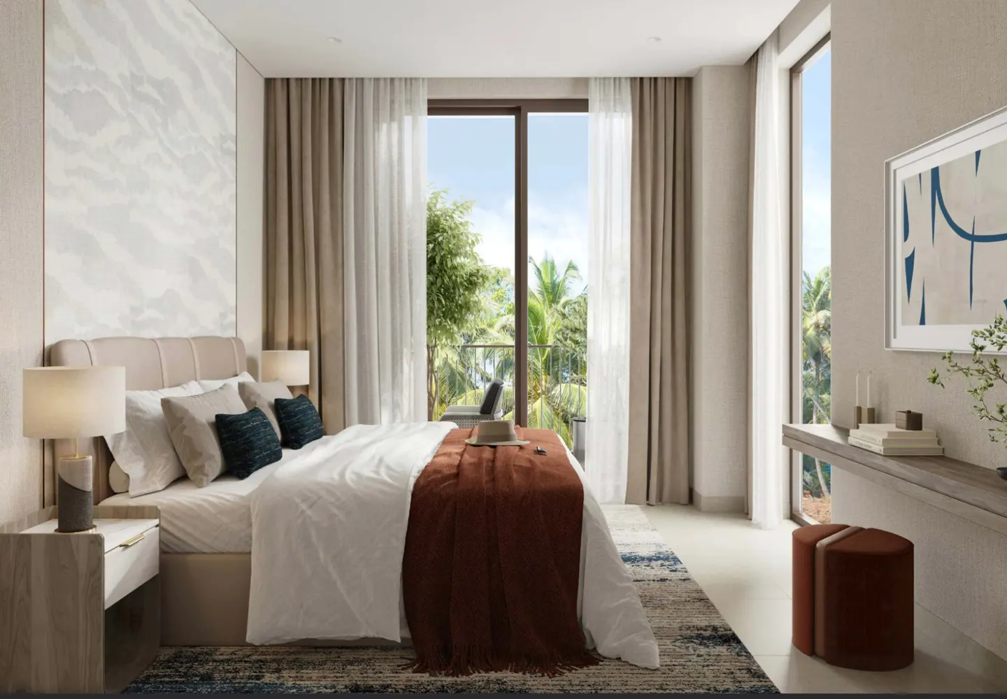 Bedroom with a bed, white sheets, brown throw, and pillows. A balcony with palm trees is visible through the glass doors.