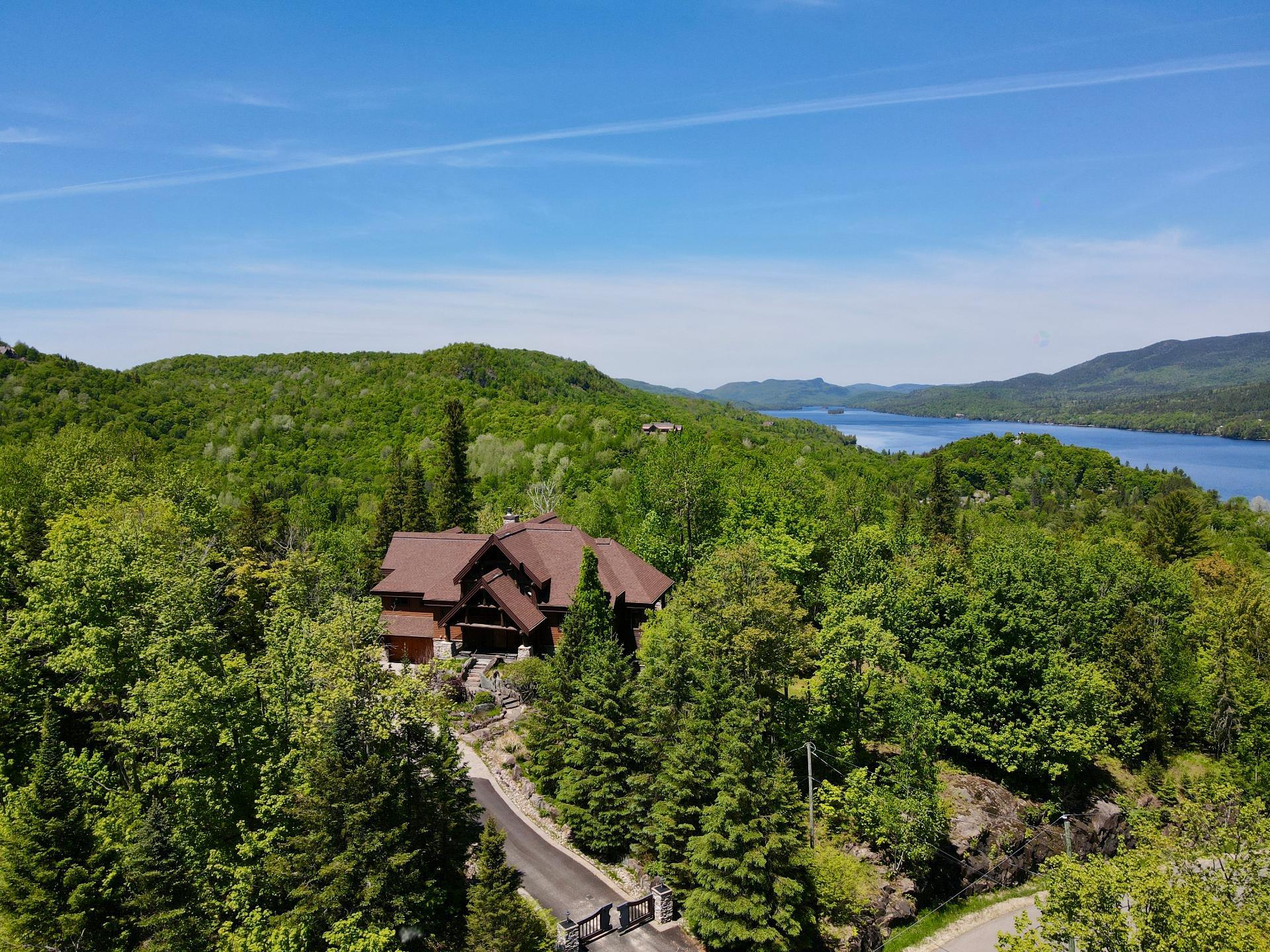 Views of the lake & ski slopes from this mountain home