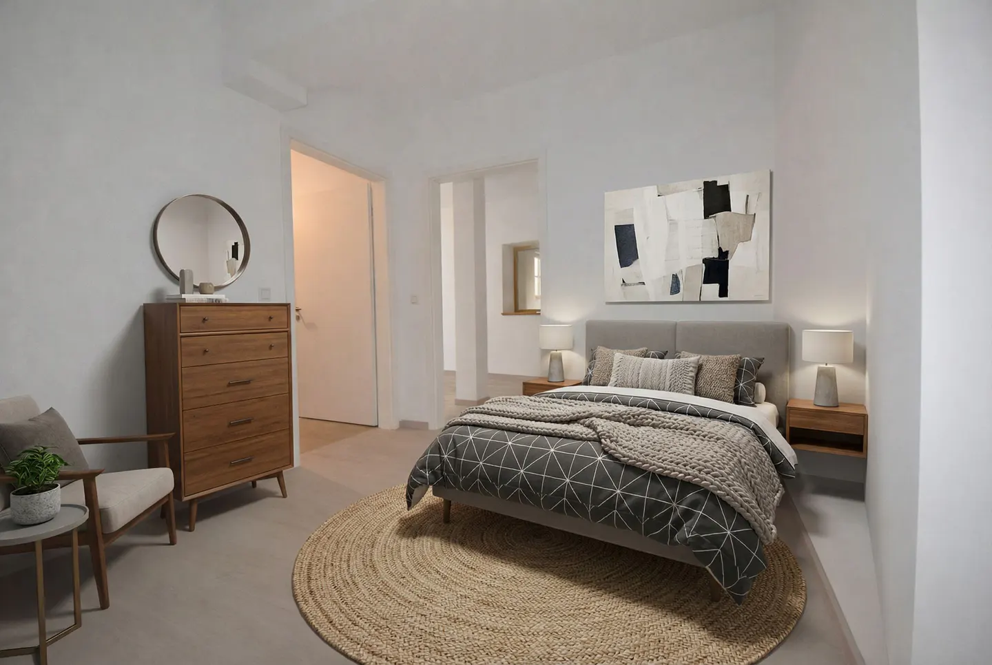 Bedroom with a bed, nightstands, lamps, and a brown dresser with a round mirror above it. A round rug is under the bed.