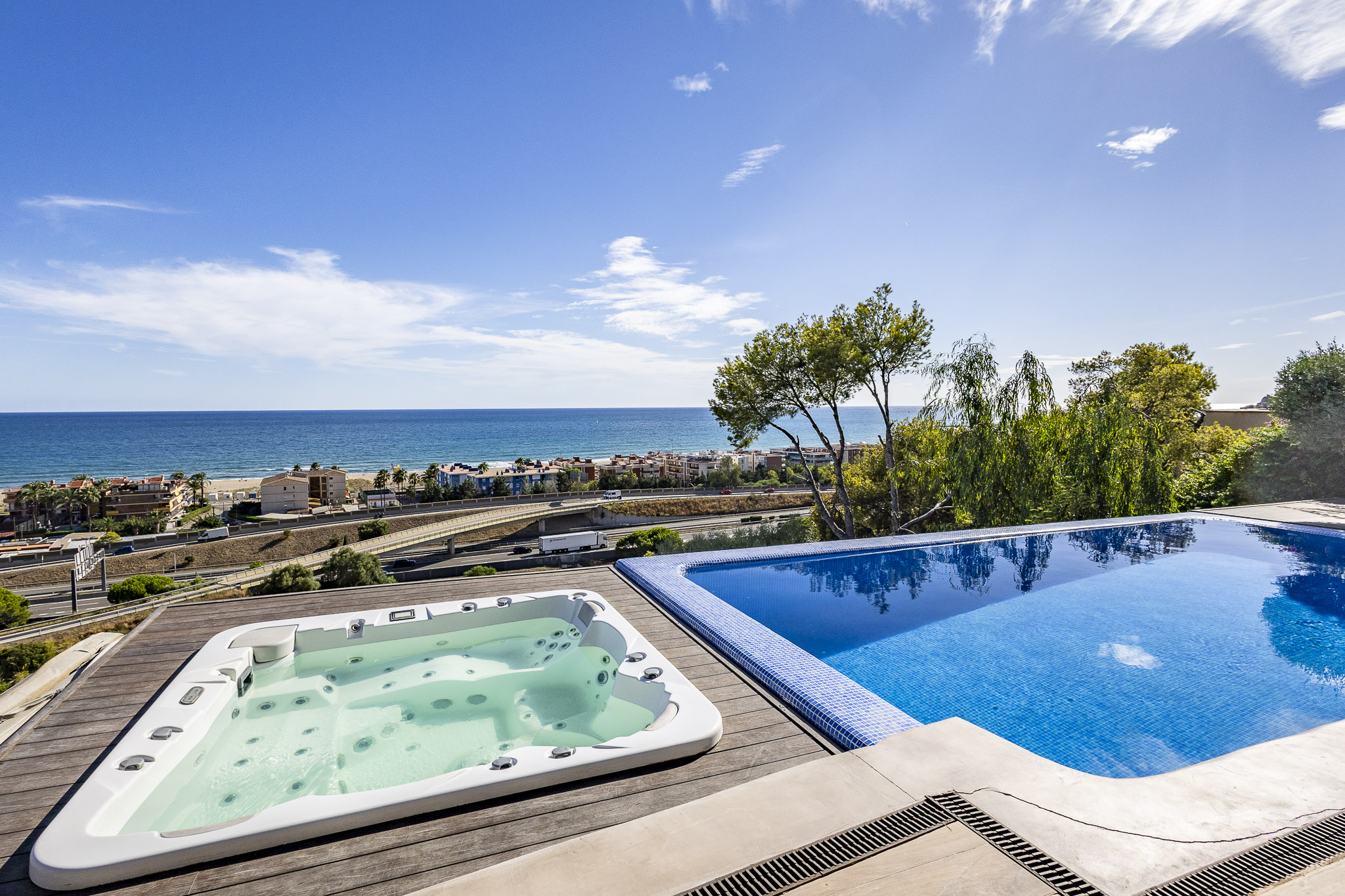 Exclusive villa in Les Botigues de Sitges with a private pool, sea views, wellness spa, and prime location just 3 minutes from the beach