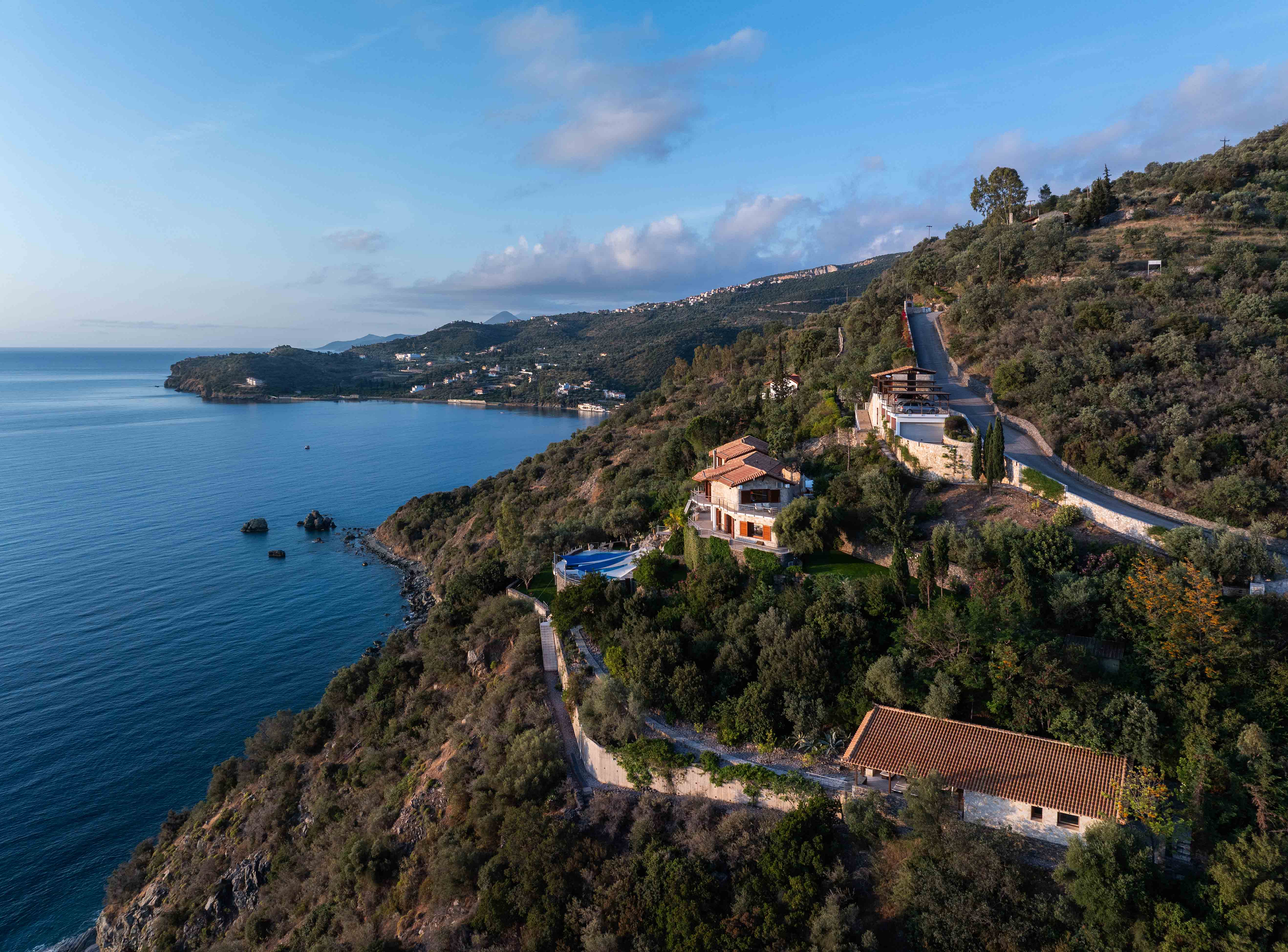Seafront villa with spa and seafront maisonette with panoramic views in Pera Melana, Arcadia