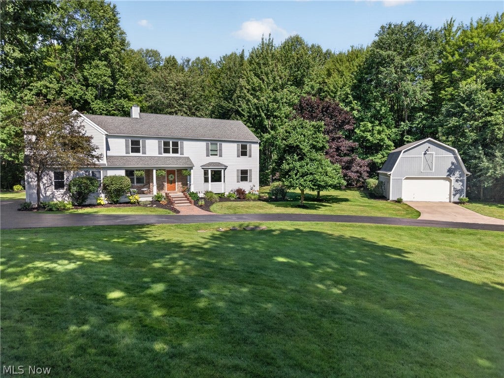 Updated Colonial on 2 Wooded Acres in Chardon