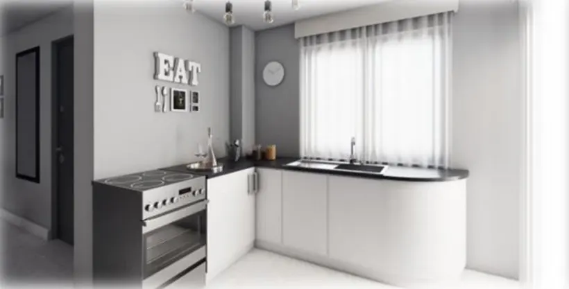 A modern kitchen with white cabinets, a black countertop, and a stainless steel stove. A window with sheer curtains is above the sink. "EAT" art hangs on the gray wall.