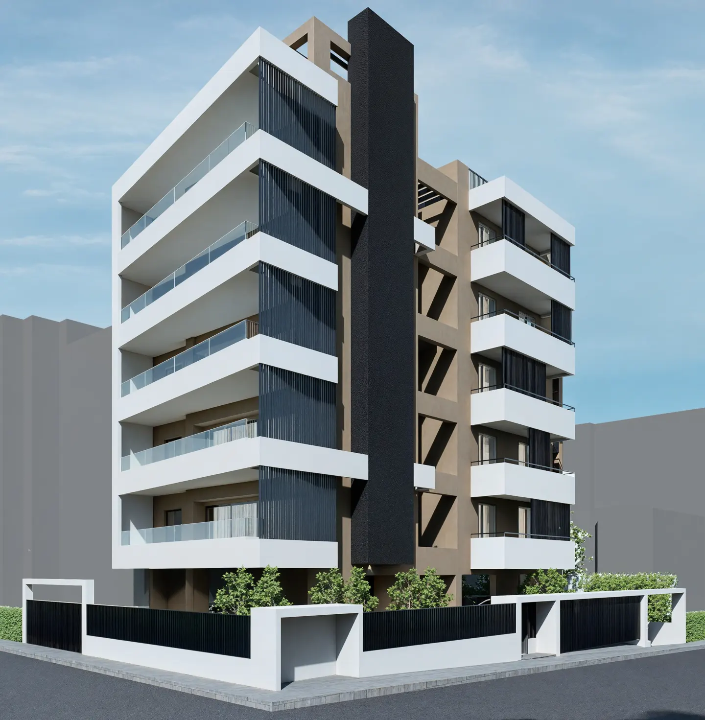 Modern apartment building with white balconies, glass railings, and a black accent column. A low white wall surrounds the property.