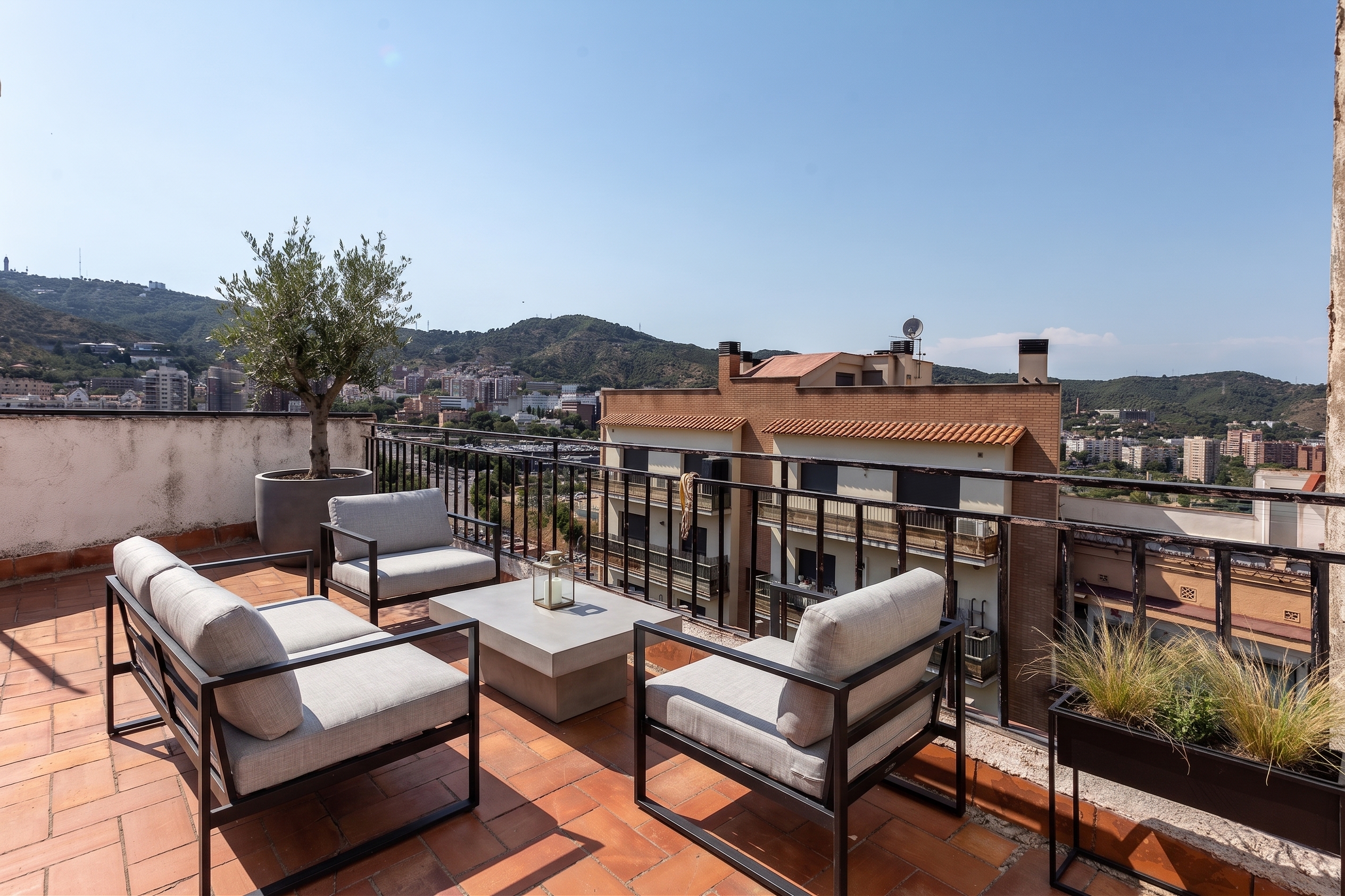 Renovated duplex penthouse with 3 terraces, panoramic views, and all-day light