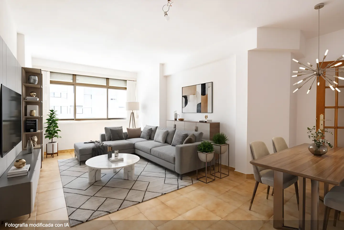 Bright living and dining area with gray sectional sofa, marble coffee table, and wood dining table with beige chairs. Large windows provide natural light.