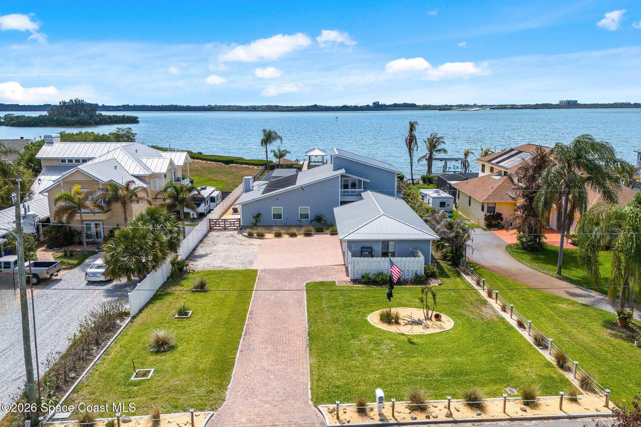 Luxury Riverfront Living with Private Dock and Resort-Style