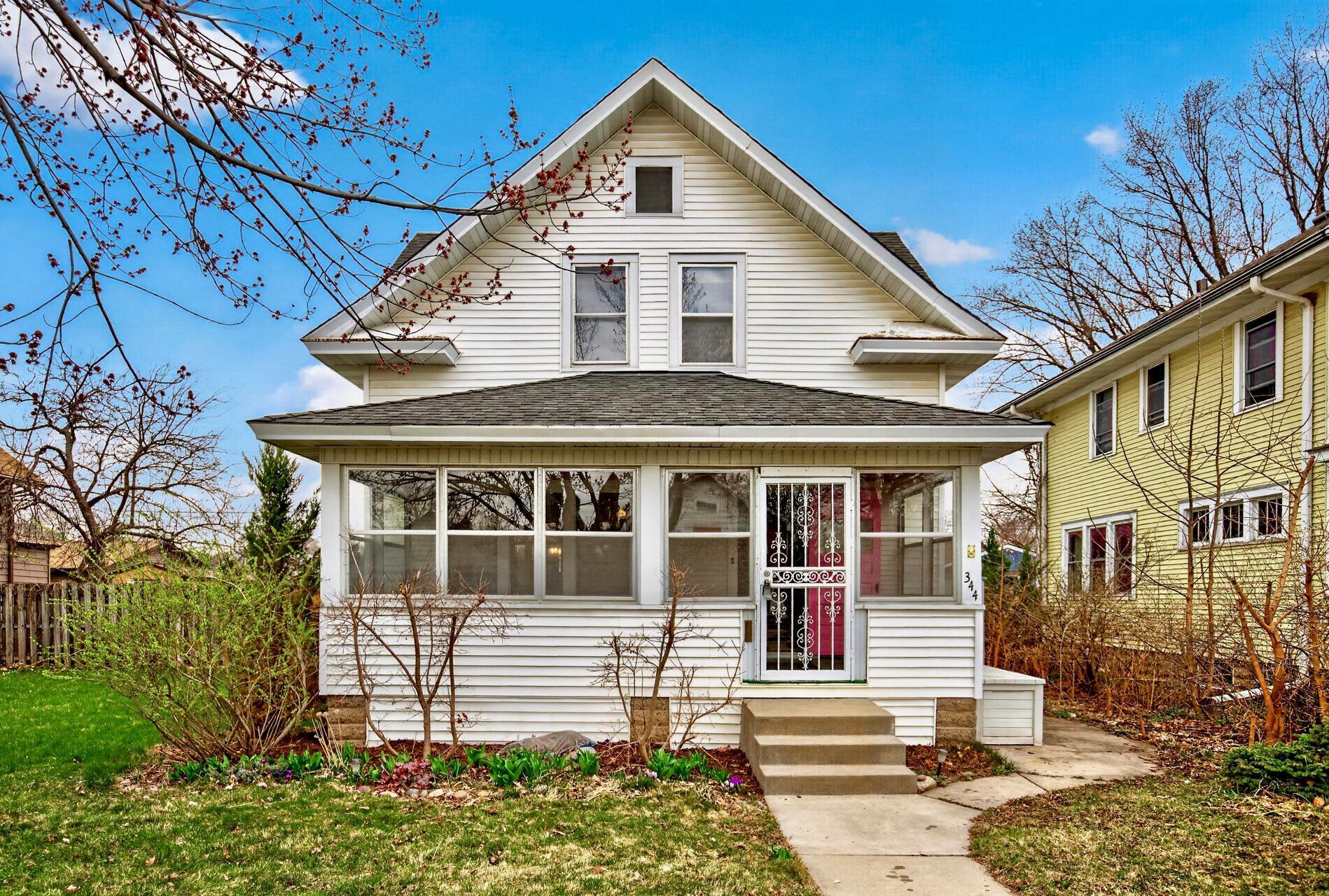South St. Paul Heritage: 1910 Craftsmanship on Double Lot