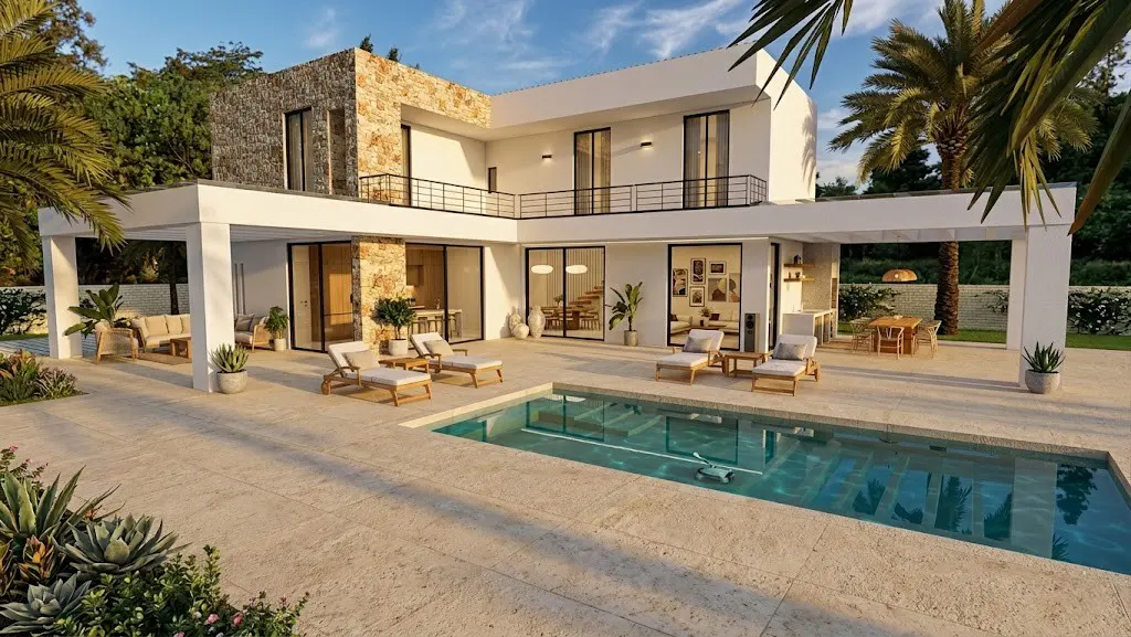 Modern two-story house with a pool. White walls, stone accents, black framed windows, and lounge chairs by the pool.