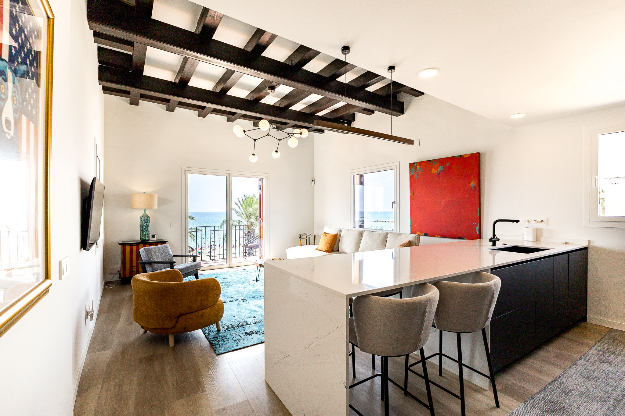 Sophisticated new flat in Sitges with panoramic views of the iconic Santa Tecla Church and the sea