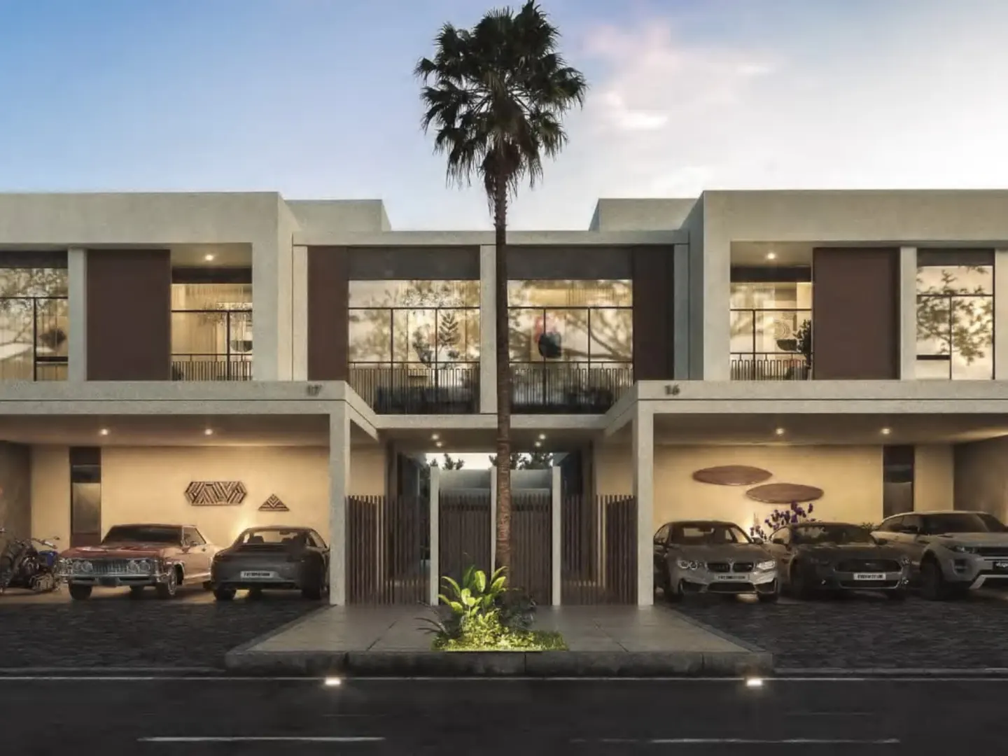 Modern two-story townhouses with carports, showcasing multiple parked cars. A tall palm tree stands between the units against a blue sky.