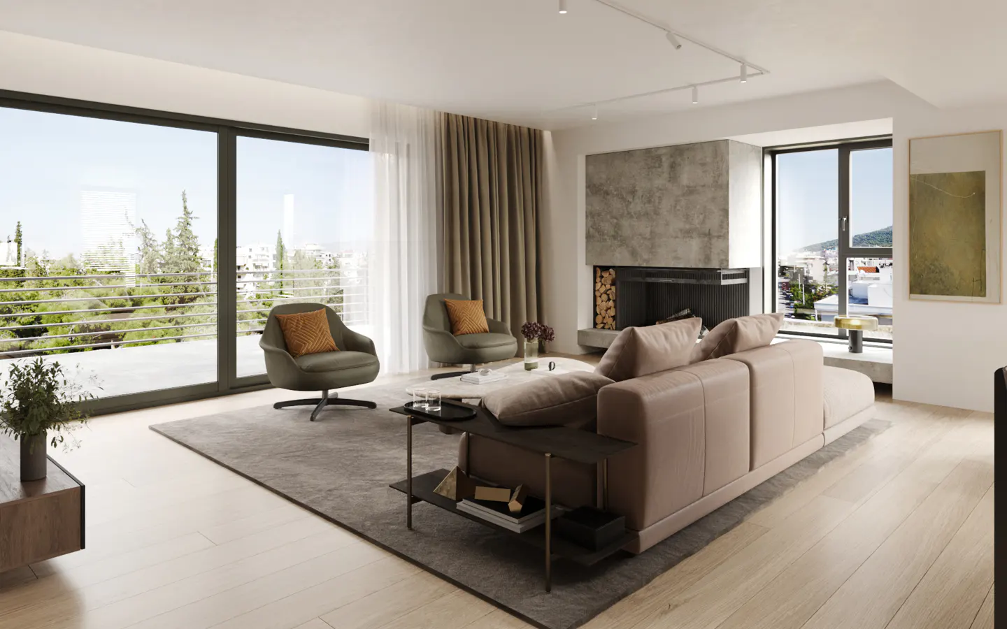 Bright living room with a beige sofa, two green armchairs, and a fireplace. Large windows offer a view of trees and a cityscape.