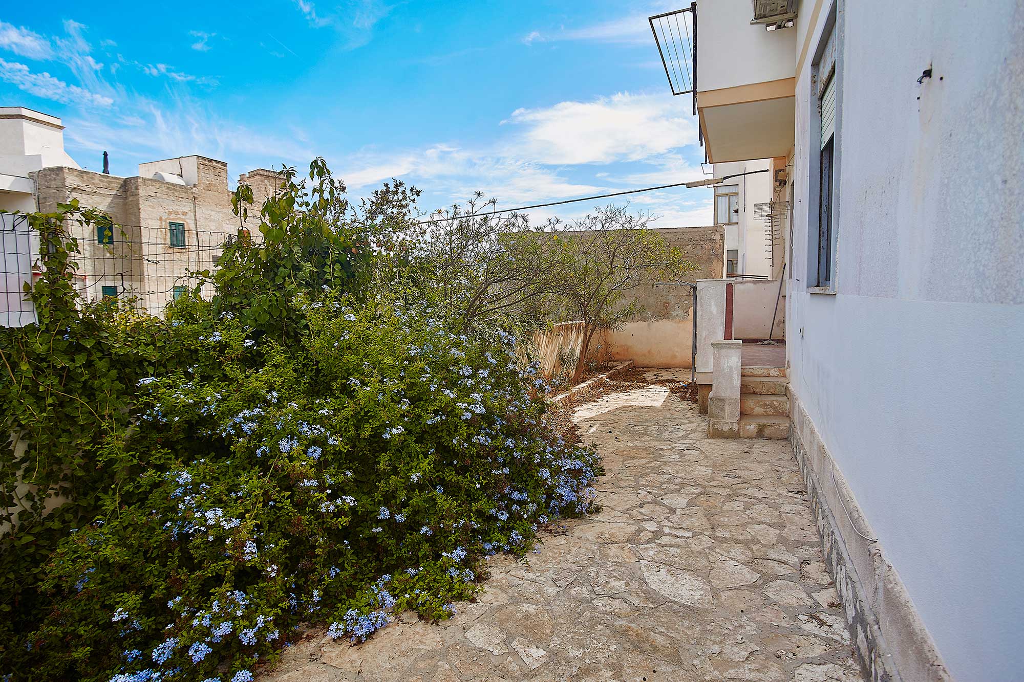 Appartamento in centro con piccolo giardino privato
