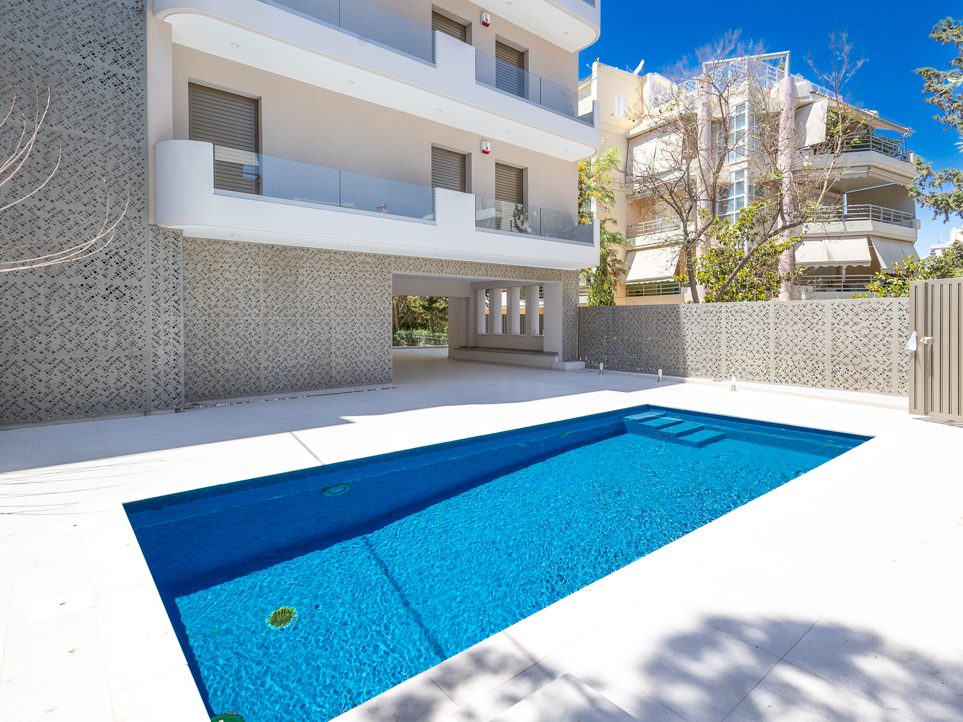 Elegant 3rd floor newly built apartment with shared pool in Voula
