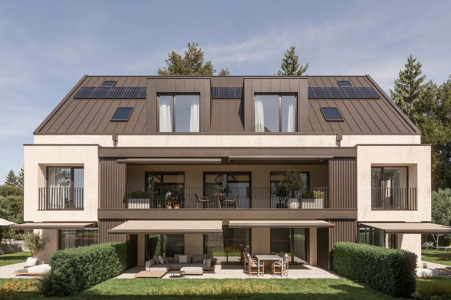 Three-story beige building with a brown roof and solar panels. Balconies with outdoor furniture and green lawn.