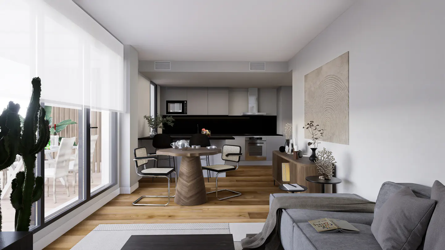 A modern apartment interior with a gray sofa, wooden table and chairs, and a kitchen in the background. A cactus stands near a window.