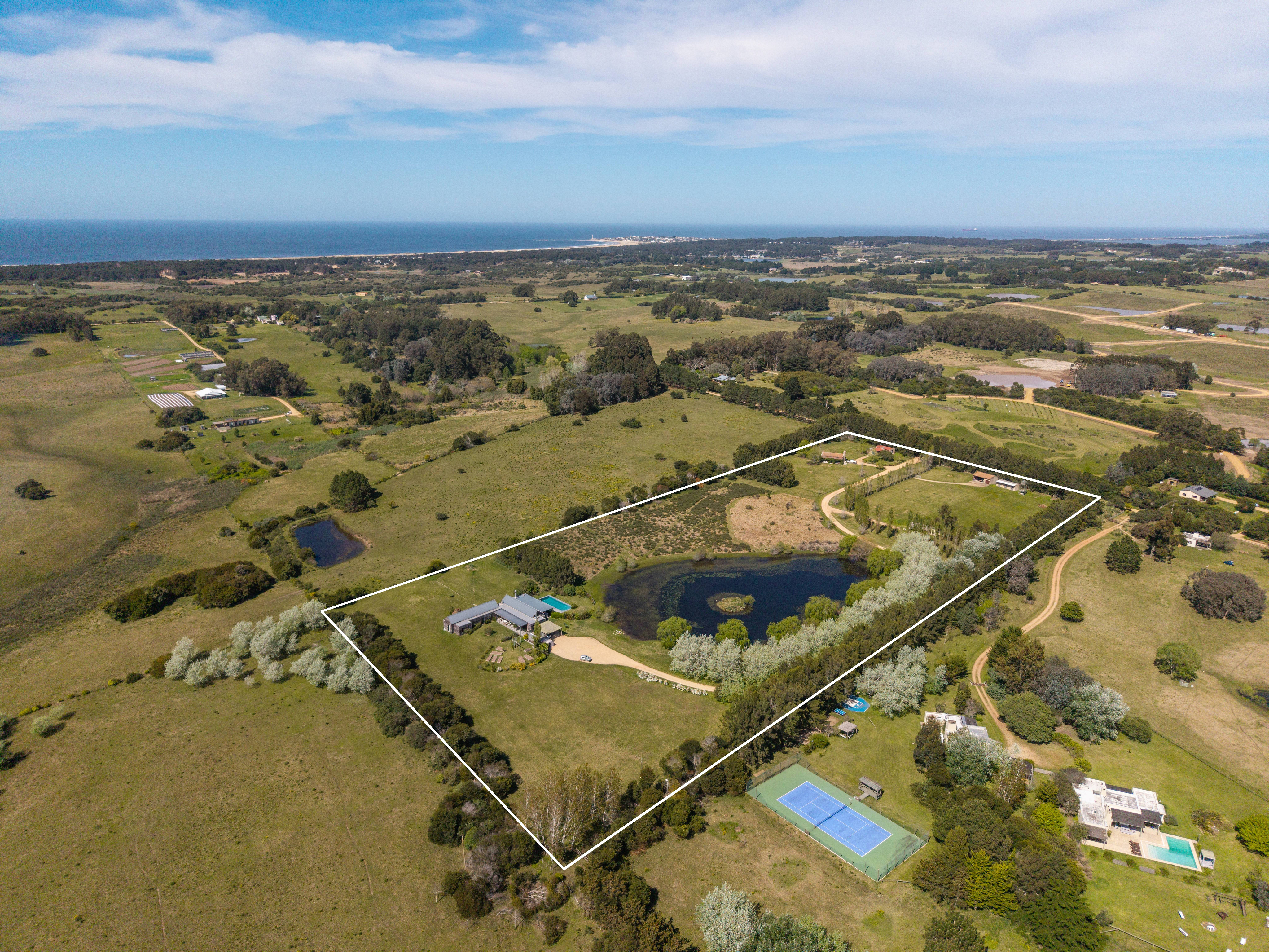 Seaside estate with beautiful landscaping and great potential