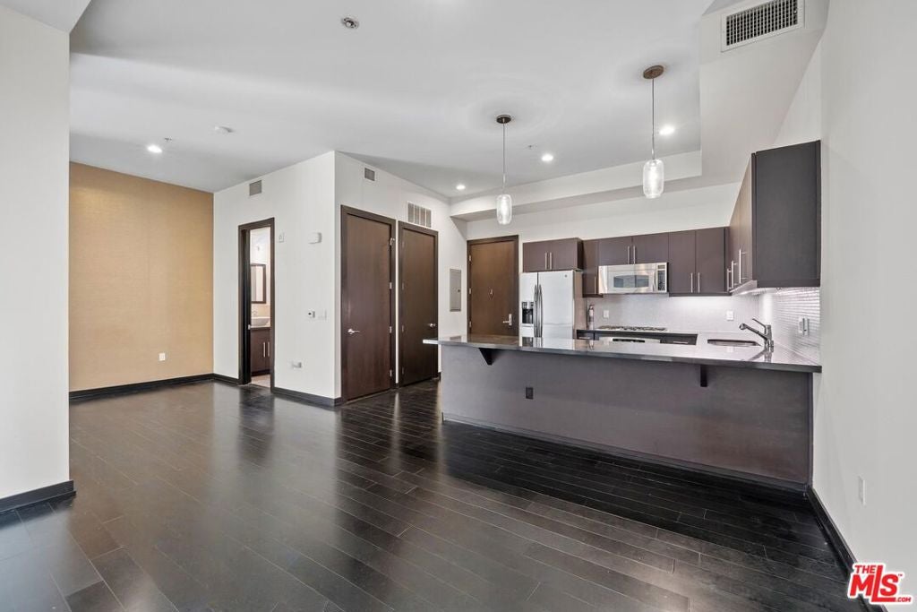 Modern Downtown LA Condo with Sleek Finishes & Views