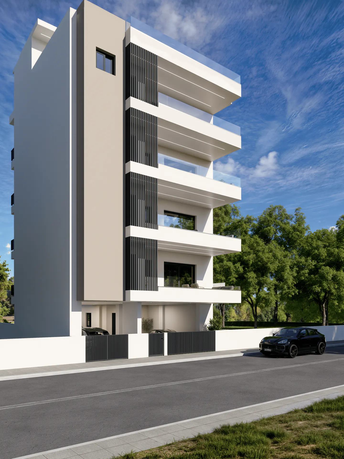 Modern white apartment building with balconies and black vertical slats, set against a blue sky and green trees. A black car is parked on the street.