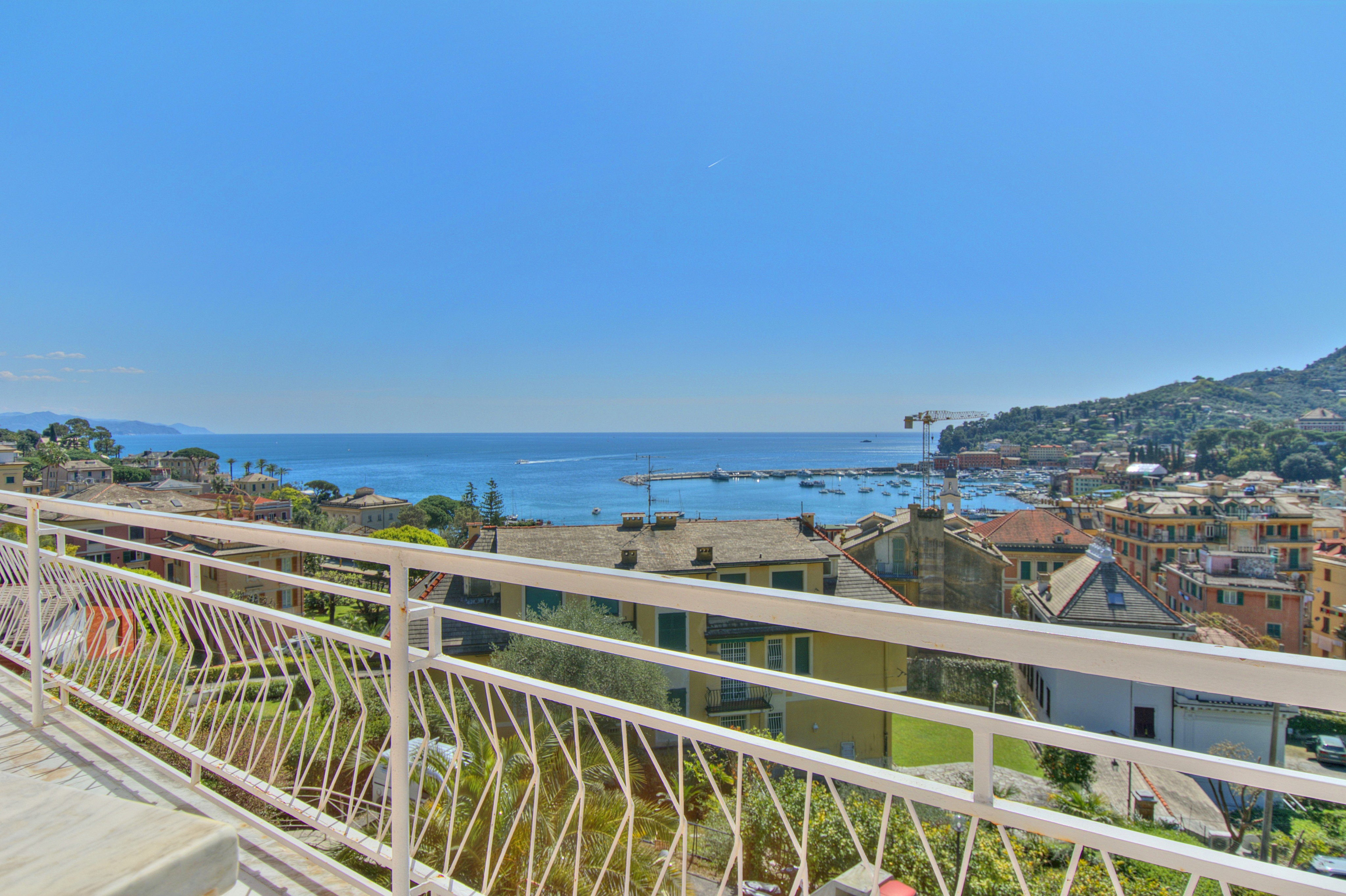 Portion of villa with garden and sea view