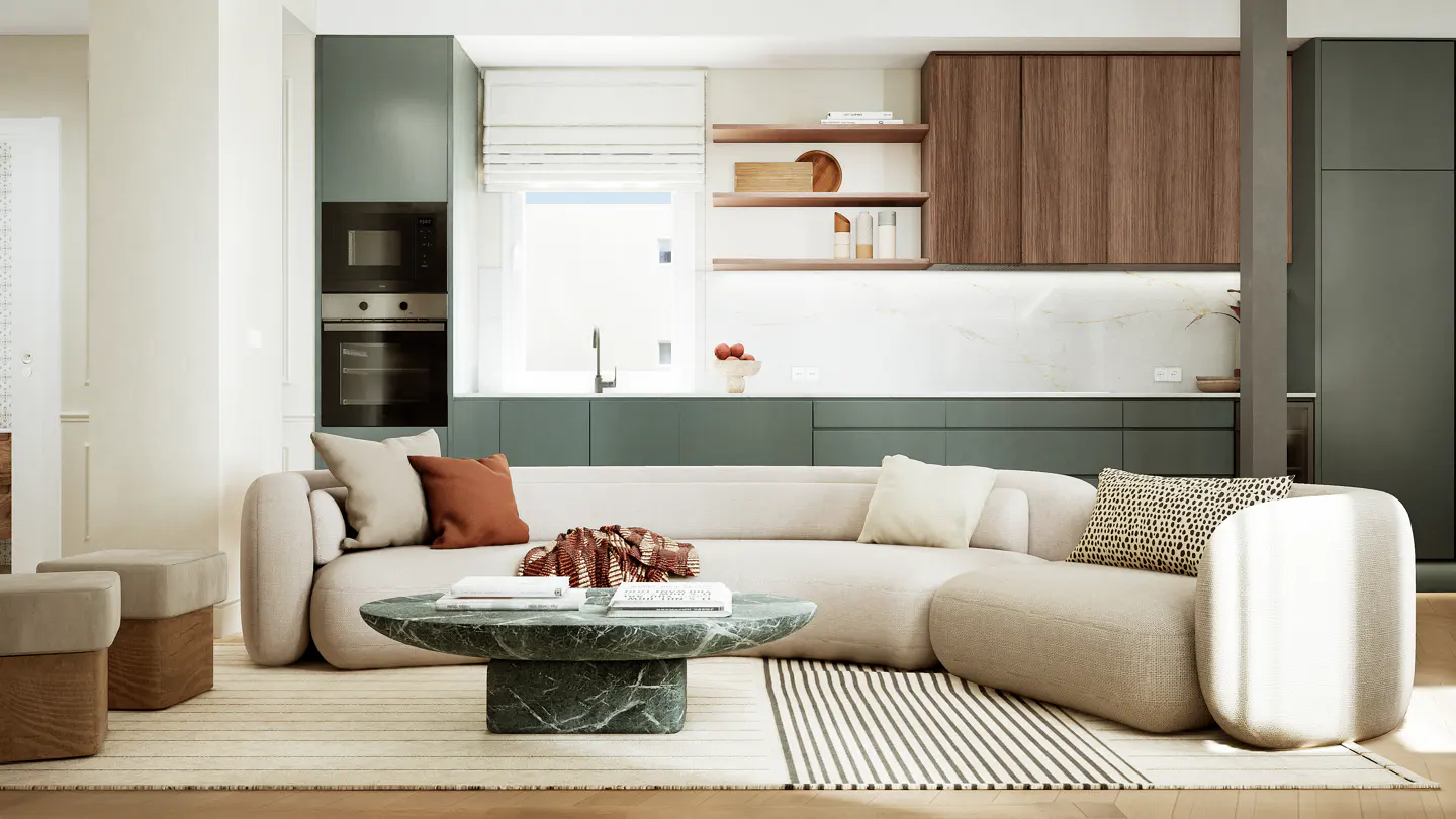 A modern living space with a beige sectional sofa, a green marble coffee table, and a kitchen with green cabinets in the background.
