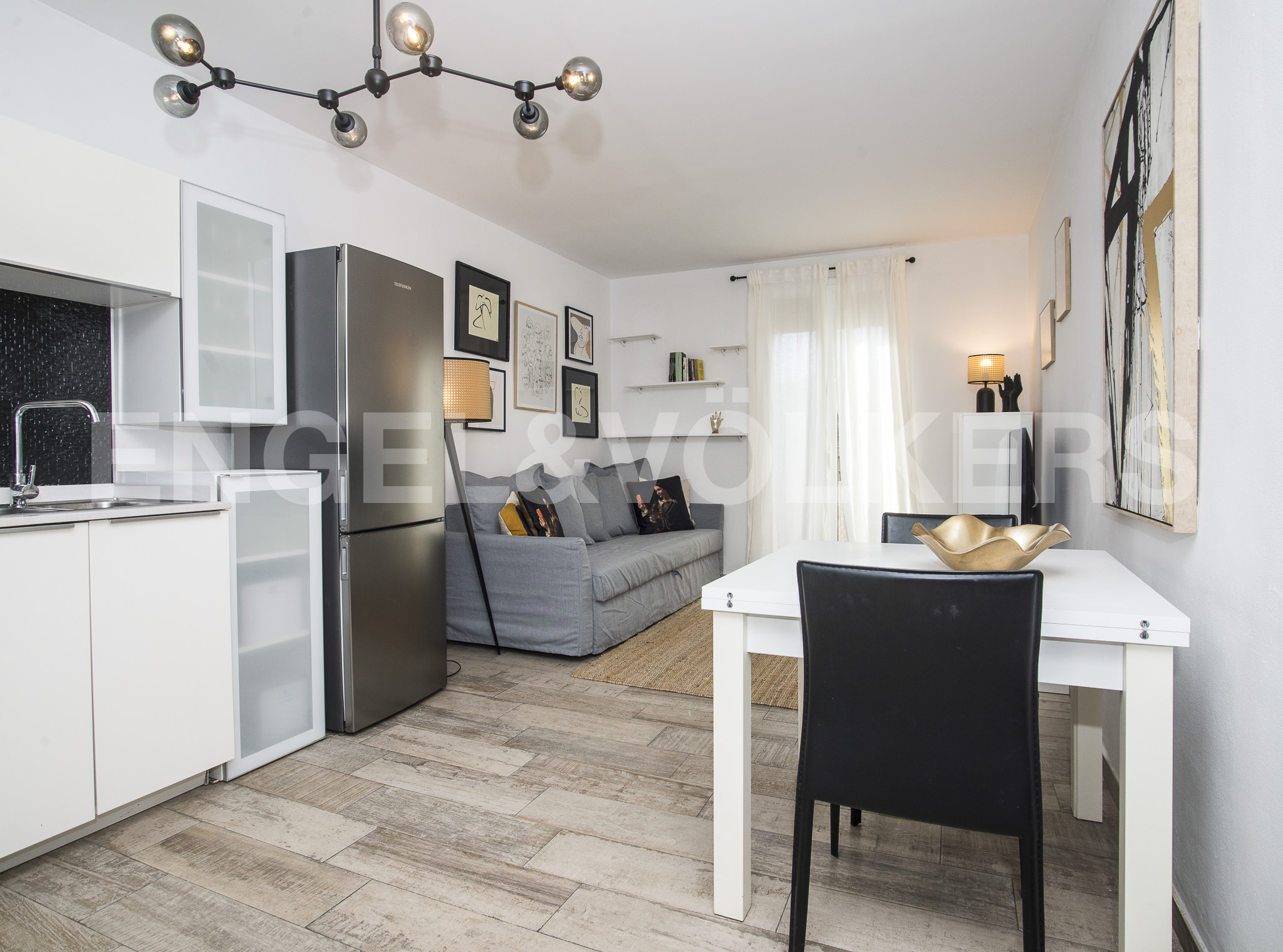 Renoviertes, charmantes Penthouse im linken Eixample