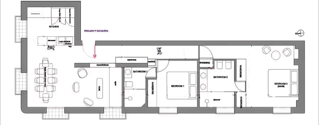 Floor plan of a two-bedroom apartment with a kitchen, dining area, living room, and two bathrooms. The plan is in black and white.