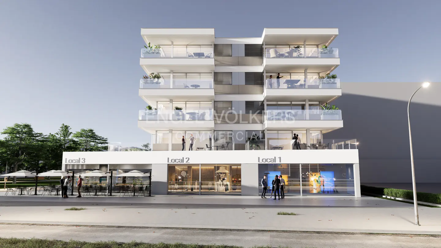 Modern white building with commercial spaces and residential units. Balconies with glass railings and outdoor furniture. Street view with people.