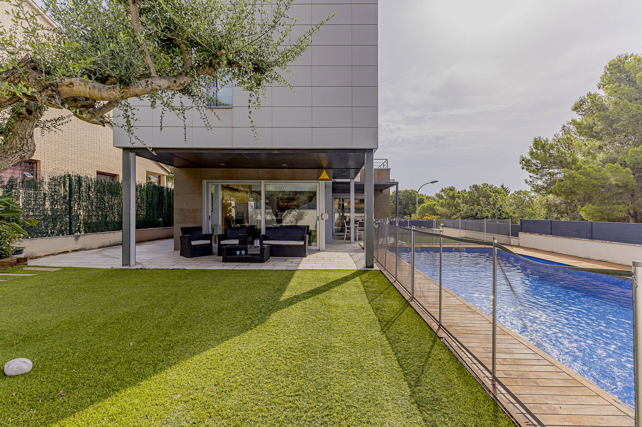 Modern designer villa with pool, solarium, and sea views.