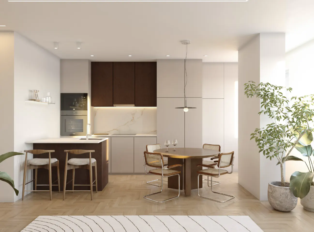 Modern kitchen with dark wood cabinets, a breakfast bar, and a round dining table with four chairs on herringbone floors.