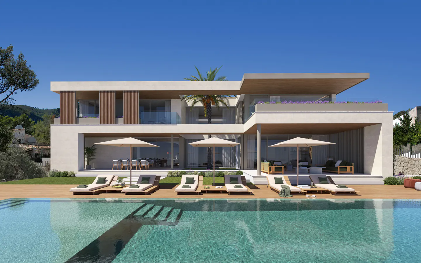 Modern two-story house with a pool. Lounge chairs and umbrellas surround the pool. The house is white with wood accents.