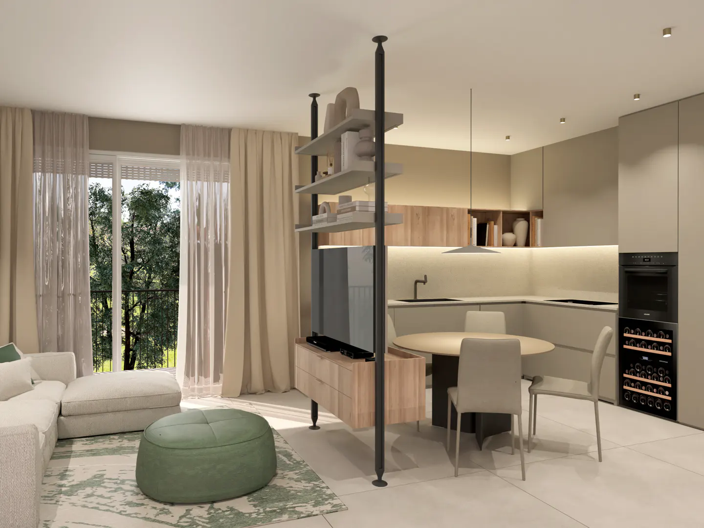 Open-concept living space with a white sofa, green ottoman, and a kitchen with a round table and chairs. A black shelving unit divides the space.