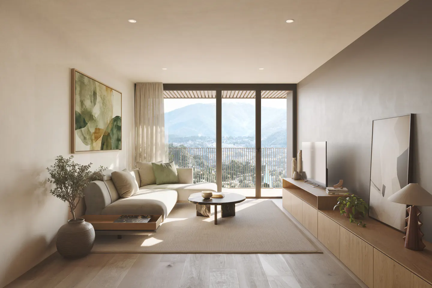 Bright living room with a beige sofa, wood floors, and a large window with a mountain view.