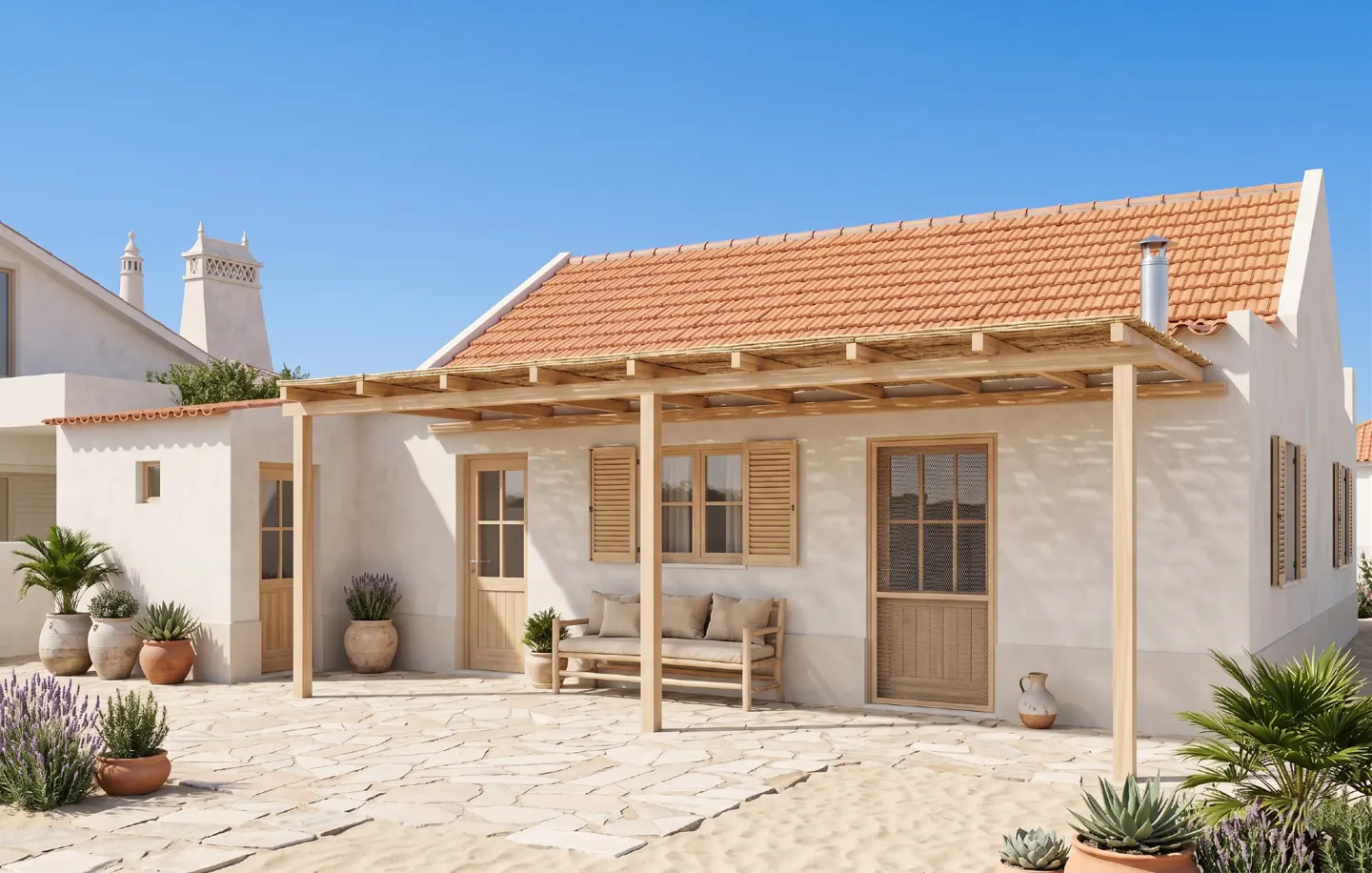 Exterior of a white stucco house with a terracotta tile roof and a wooden pergola. A stone patio and potted plants surround the house.